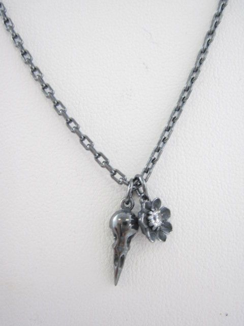 Description You are bidding on a NEW DESIGNER Silver Tone Chain Skull 