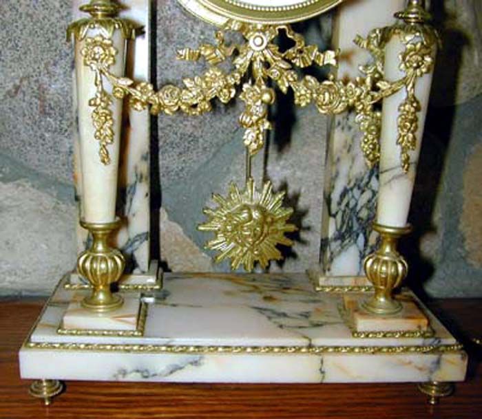 metal on it is brass, quite a bit is Ormolu also The base, columns 