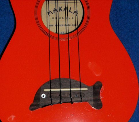 KALA MAKALA DOLPHIN BRIDGE UKULELE OUTFIT ORANGE  