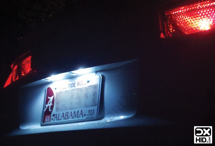 Two of our 194 5 5050SMD Hyper White Bulbs in a 2010 Camaro tag light