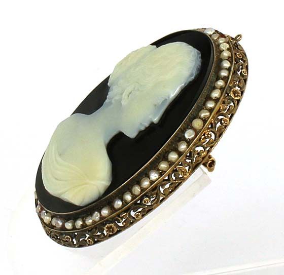 this is an antique victorian 14k gold and massive stone cameo pin